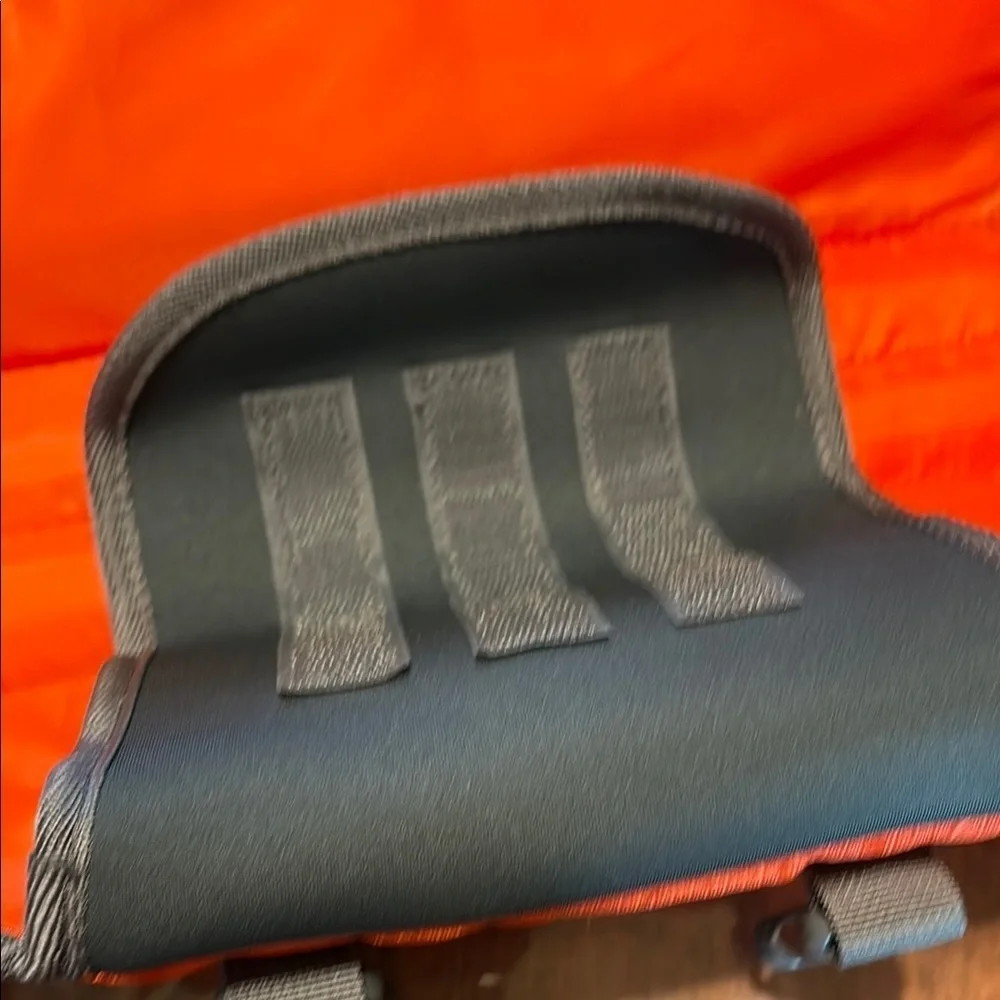 Orange Life Jacket with Black Straps